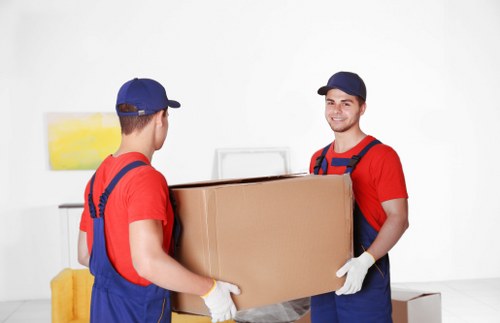 Office relocation planning in Earls Court with moving boxes and workplace furniture