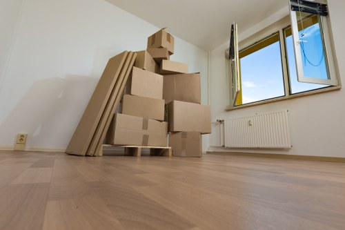 Removal team preparing boxes and furniture for an Earlscourt home move