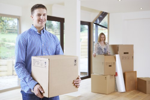 Professional furniture pick-up team handling items in Earls Court