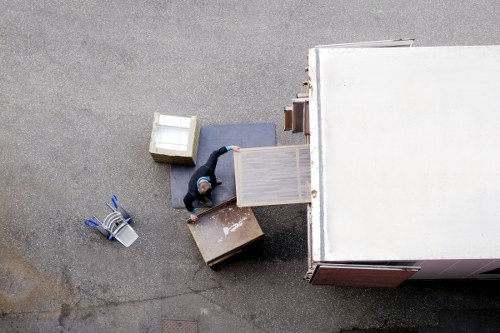 Trusted removal company team transporting household belongings