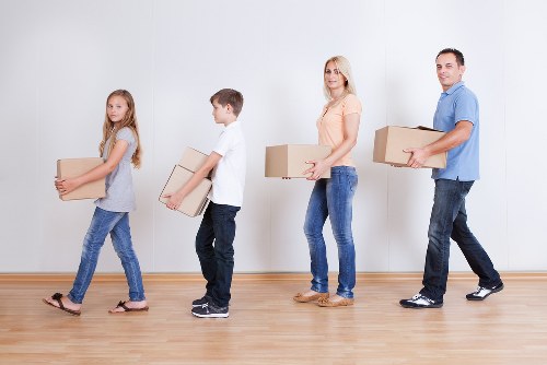 Loading household items into a van for an Earls Court move