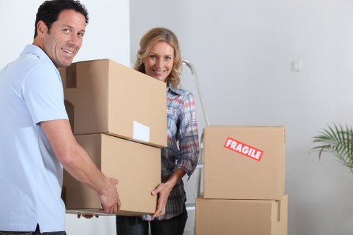 Boxes and furniture being loaded for removals near Earls Court